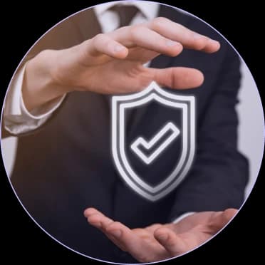 Hands cradling a shield checkmark icon representing compliance