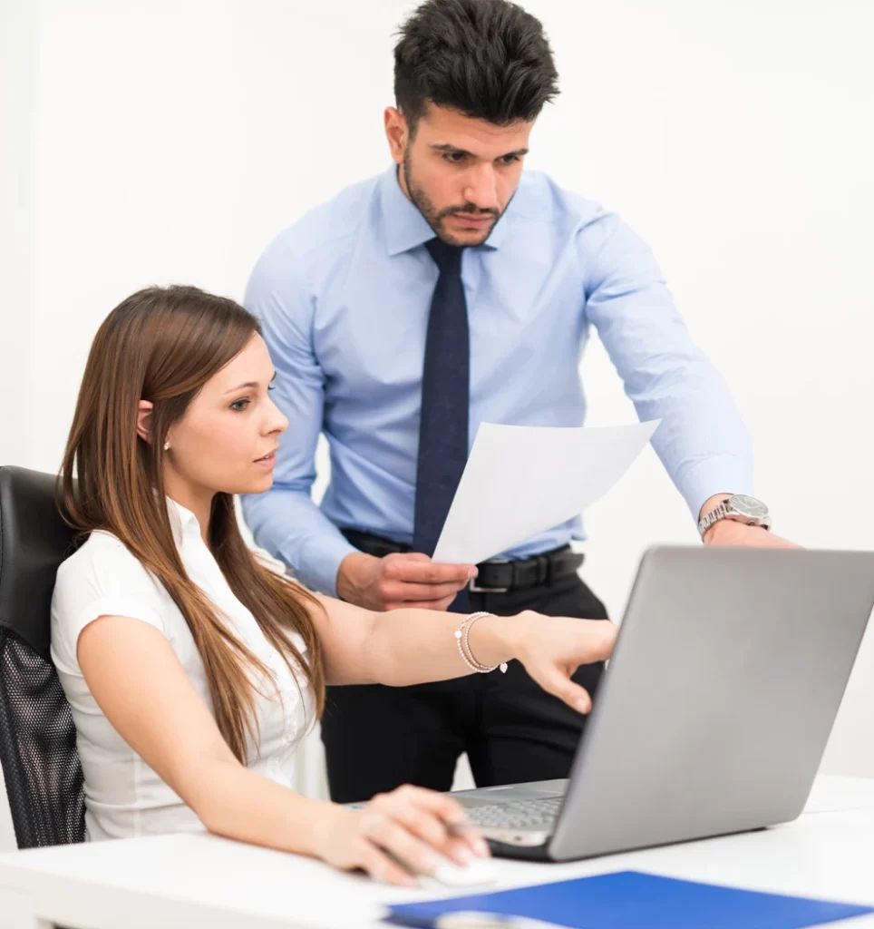 Medical billing consultants reviewing claims with a provider