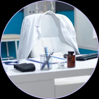 White coat hanging in an orthopedic exam room