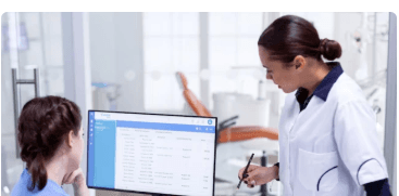 Person coding at a laptop