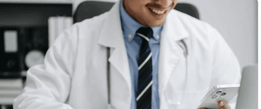 Clinician reviewing insurance payments on a phone