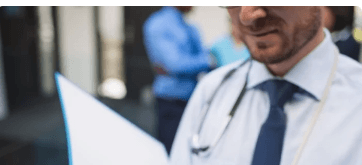 Clinician reviewing a clear billing report