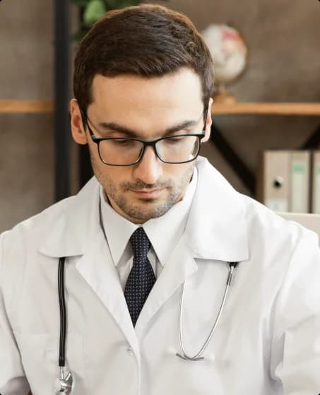 Doctor reviewing medical revenue cycle information