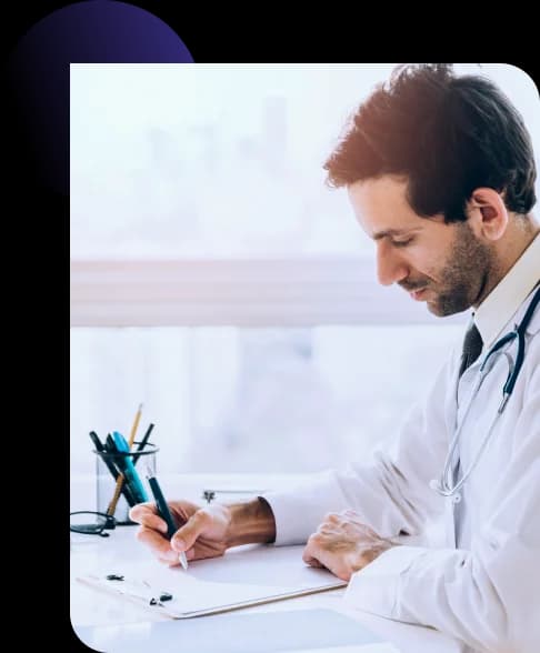 Physician reviewing credentialing paperwork