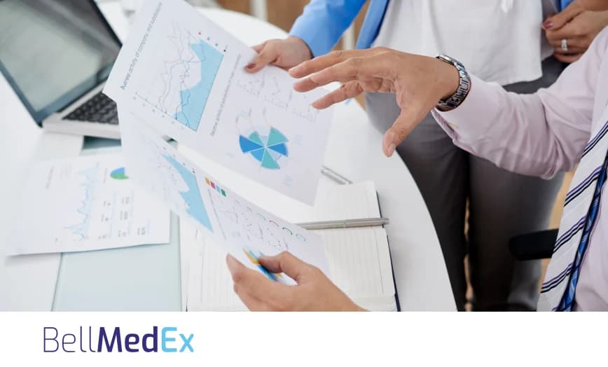 Medical billing reports being reviewed by a healthcare team