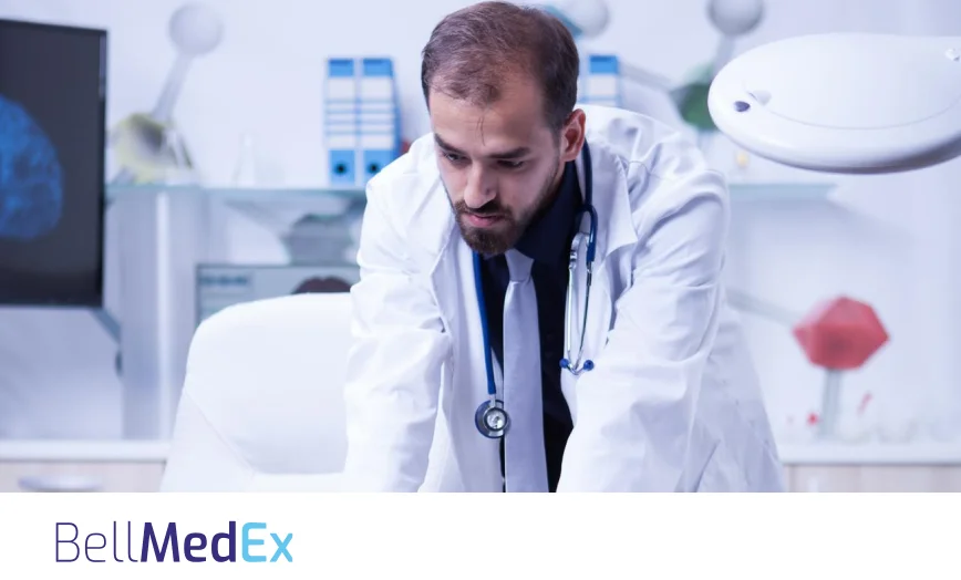 Doctor reviewing medical coding information