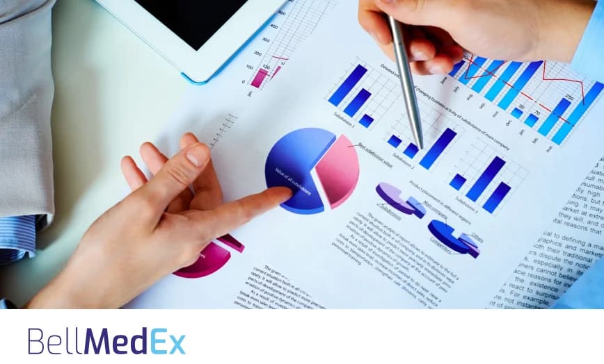 Healthcare professionals reviewing revenue charts