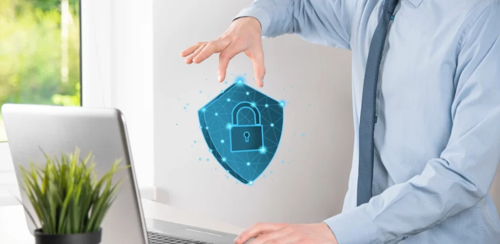 Hand reaching toward a secure data shield icon